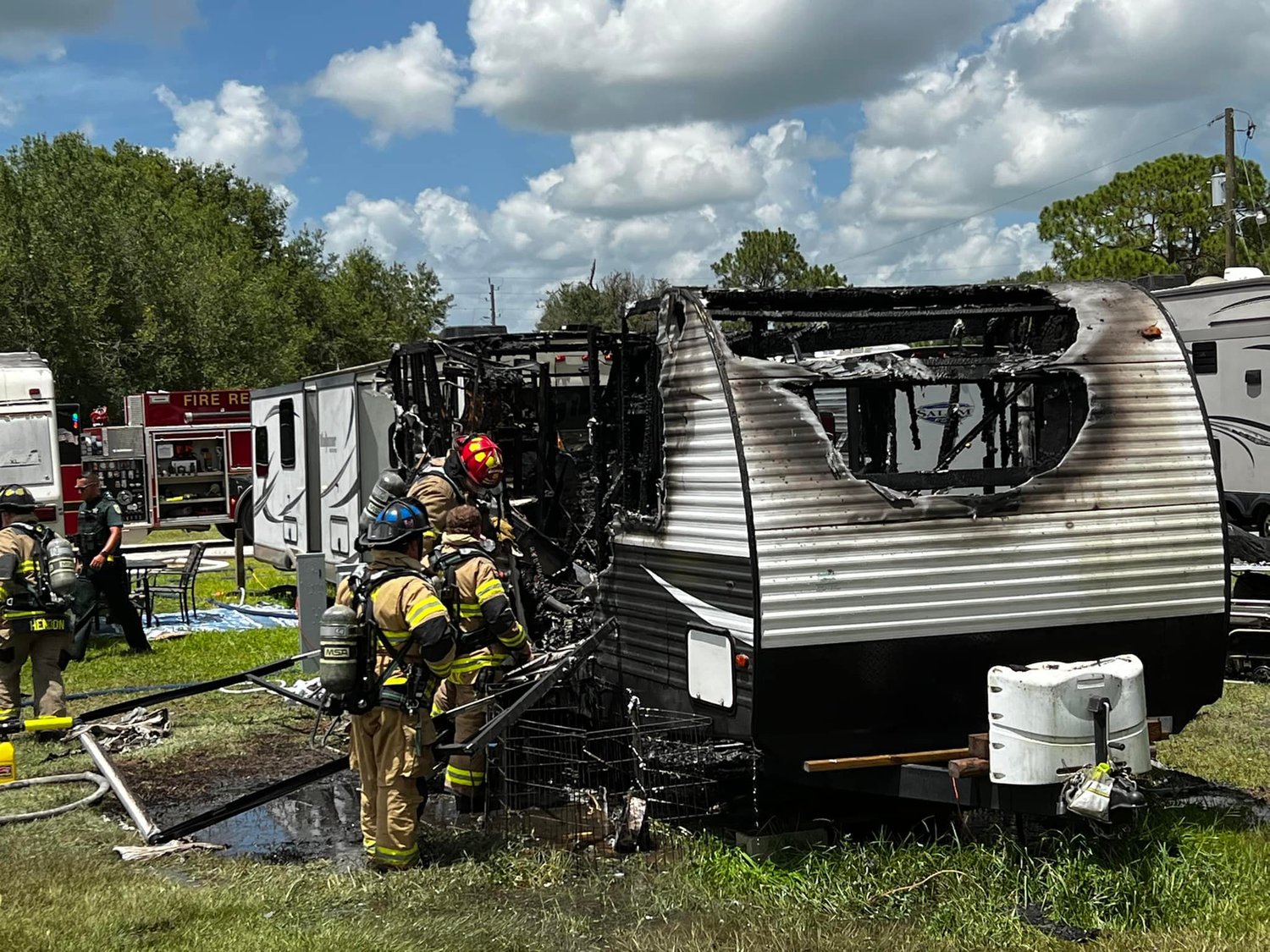 A July 24 fire destroyed the Wendy Kennett's RV and claimed the lives of her four dogs.